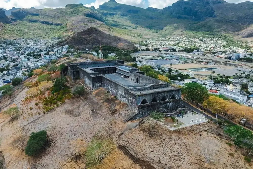 Fort lookout point above a town and mountains